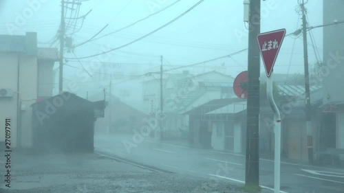 Violent Hurricane Wind Blows Debris Through City Street - Jebi