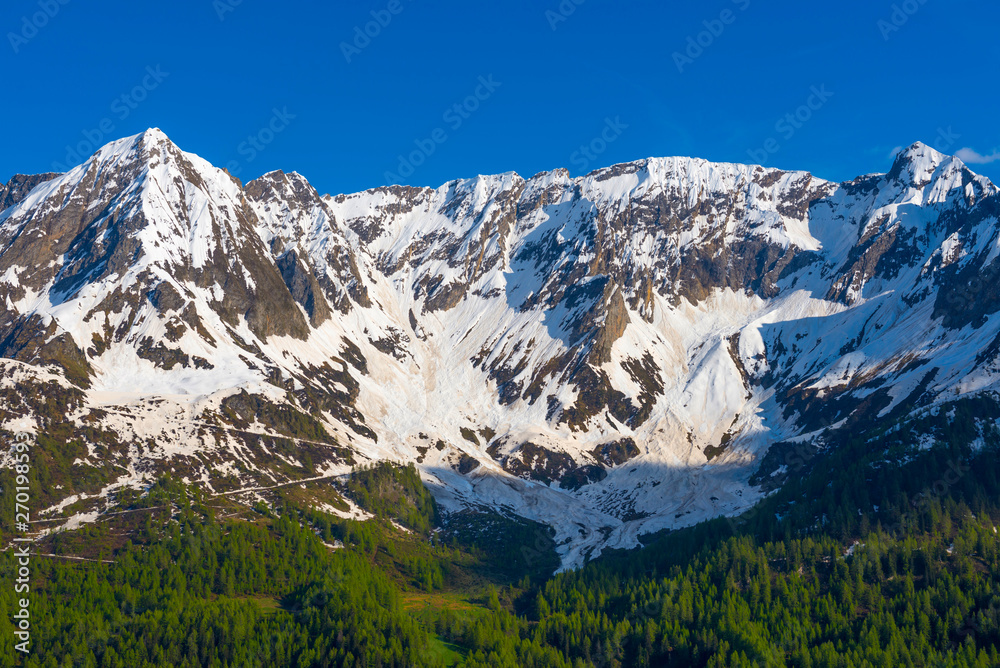 Snow-capped Mountain and Clear Sky in Switzerland.