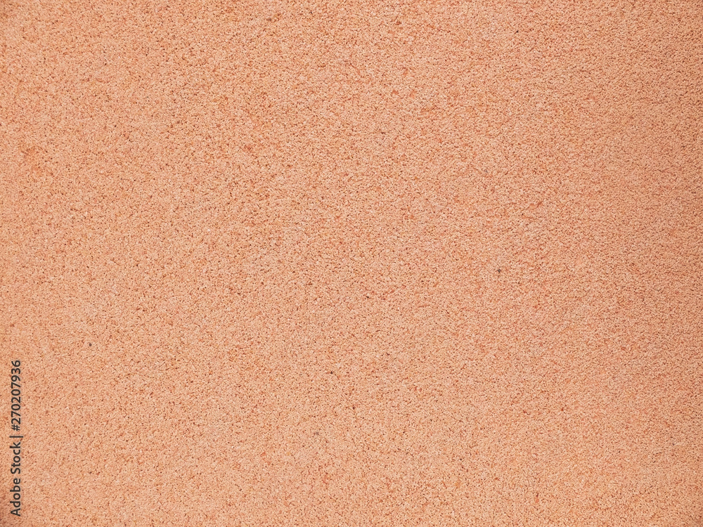 Fototapeta premium Orange plastered wall. Seamless pattern background concept
