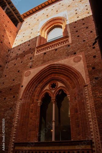 Milan, Sforza Castle: a glimpse from Cortile della Fontana, fountain court, little courtyard in the Museum of ancient art housing works ranging from the early Christian age to XVI century photo