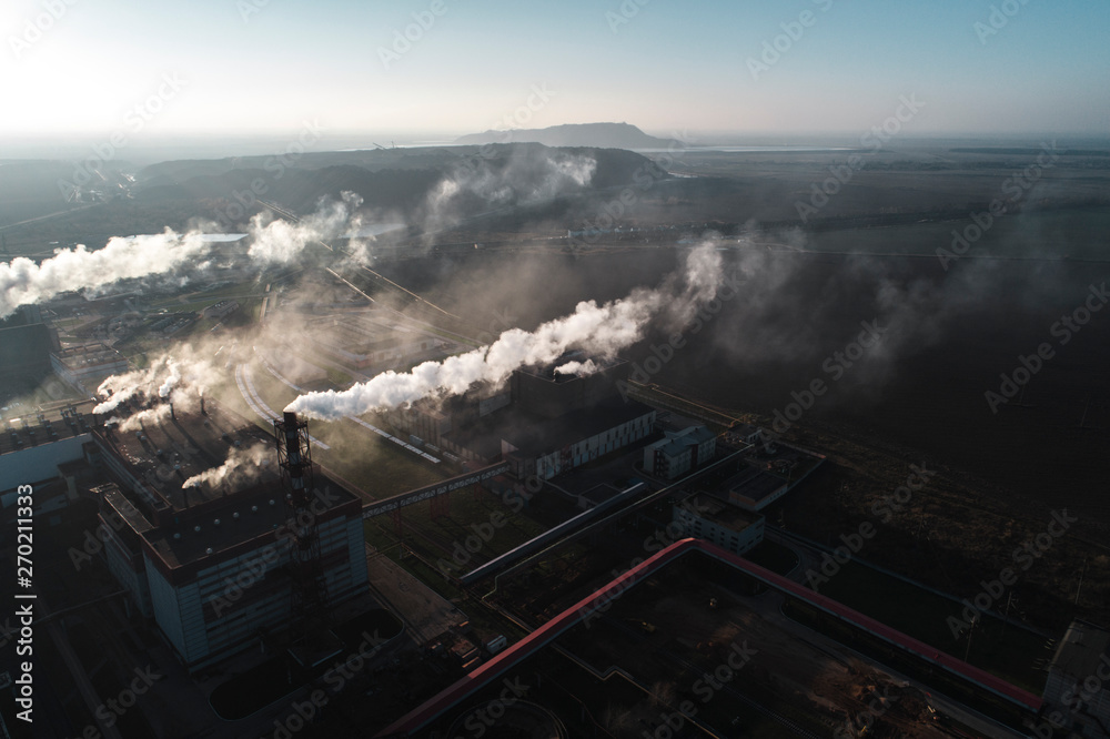 production of potash fertilizers, smoke from pipes creates pollution. shot by drone