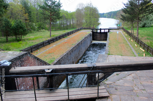 Fototapeta Naklejka Na Ścianę i Meble -  Paniewo Lock, the ninth lock and the only twin-chamber lock on the Augustow Canal in Poland. Built in 1828.