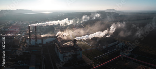 production of potash fertilizers  smoke from pipes creates pollution. shot by drone