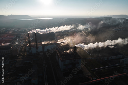 production of potash fertilizers  smoke from pipes creates pollution. shot by drone