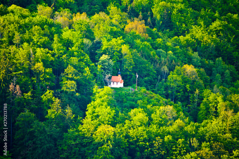 Small mountain chapel in the woods of Bavaria