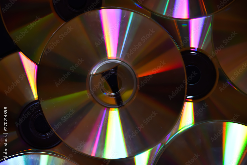 CD DVD disc multiple pile closeup detail CD DVD disc multiple pile closeup detail