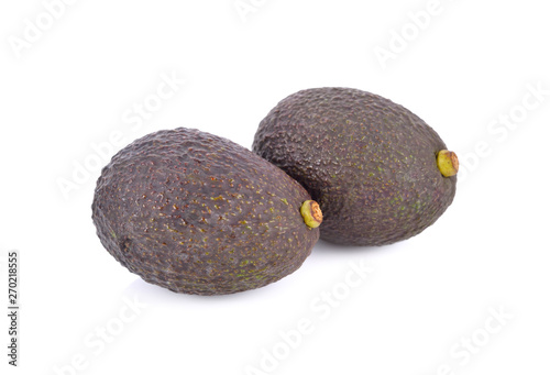 whole cut ripe avocados on white background