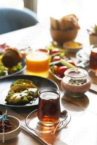 Turkish breakfast with various plates on a table