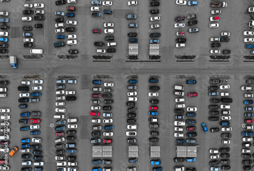 Aerial drone top view over cars on parking. Abstract pattern