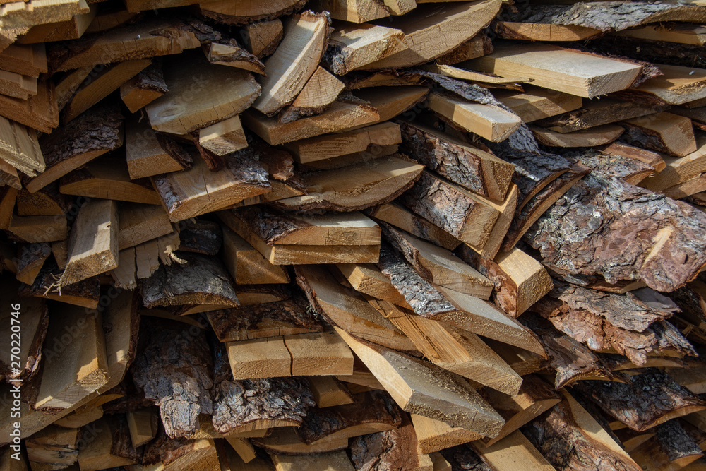 A pine boards piled in a pile background A pine boards piled in a pile background