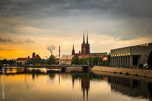 View of St. John the Baptist cathedral and other historic buildings in old town Wroclaw from Oder (Odra) river