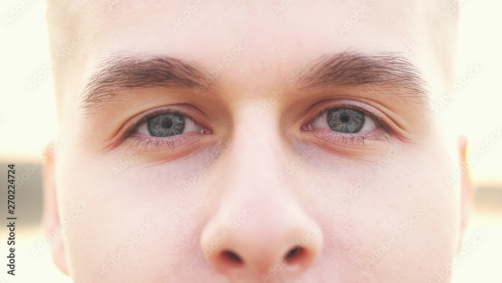 Fototapeta premium Close-up portrait of attractive caucasian man with grey eyes