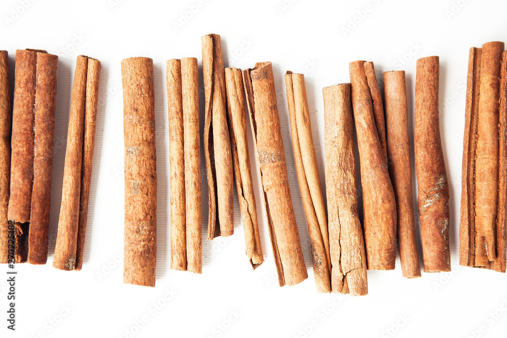 Set of cinnamon sticks on white background Set of cinnamon sticks on white background