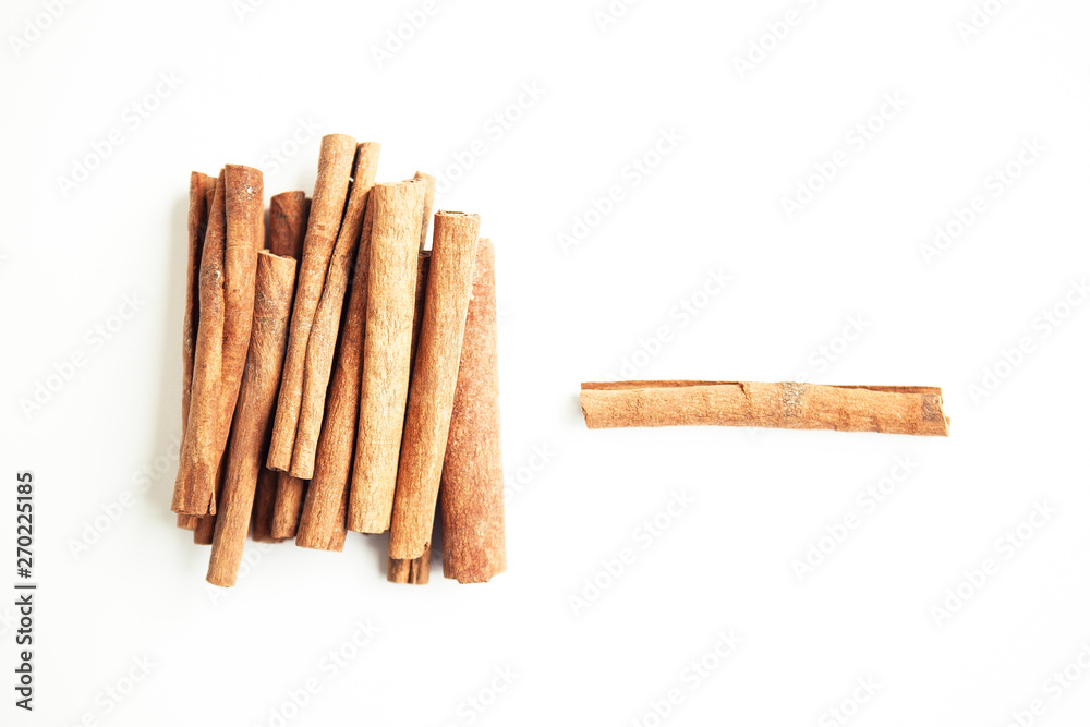 Set of cinnamon sticks on white background