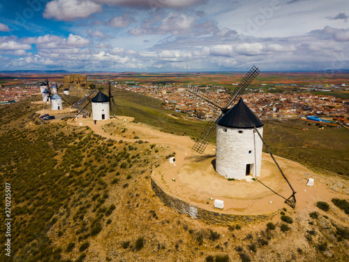 Windmills and castle of Consuegra photo