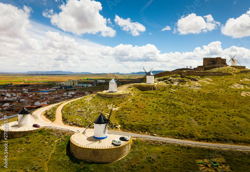 View of famous Route of Don Quixote in Consuegra with windmills photo
