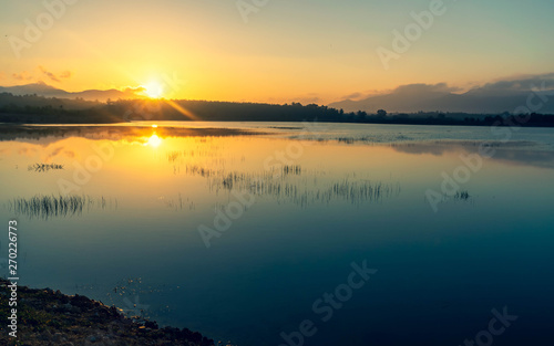 Sunrise view at the reservoir in Songkhla, Thailand.