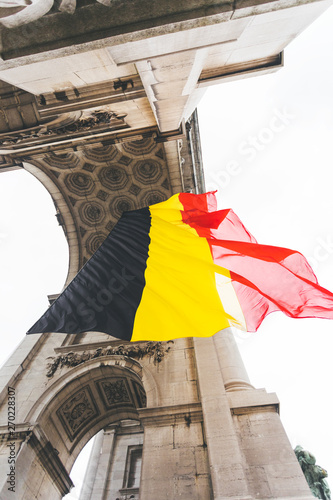 Flag of Belgium on the Arc de Triomphe in Parc du Cinquantenaire