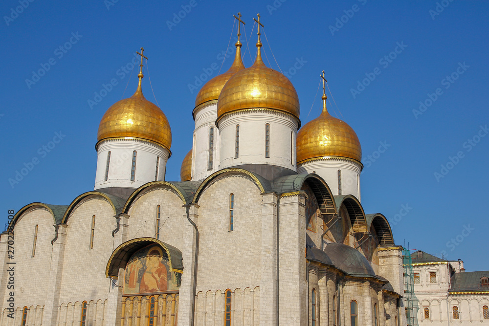 The golden cupolas of the Moscow Kremlin in Moscow ,Russia.