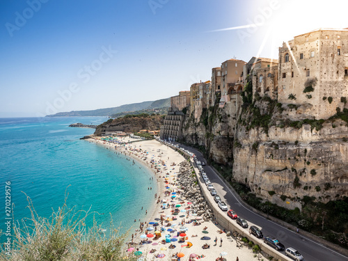 Aerial view of the beach of Tropea, the amazing seaside place in Calabria, Italy. The shot is taken during a beautiful sunny summer day photo