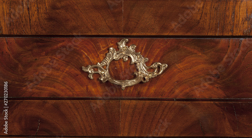 detail of an old antique furniture with a lock