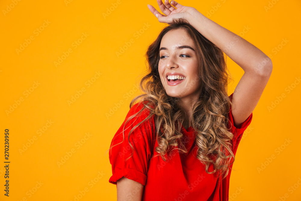 Portrait of a lovely cheerful young woman standing Portrait of a lovely cheerful young woman standing