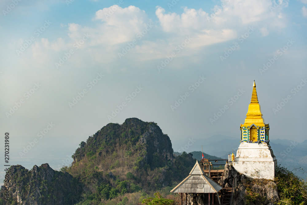 Wat chaloem phrachomklao rachanuson that the tample and pagoda on rock mountain in sunshine beautiful. Architecture landmark Lampang,Thailand