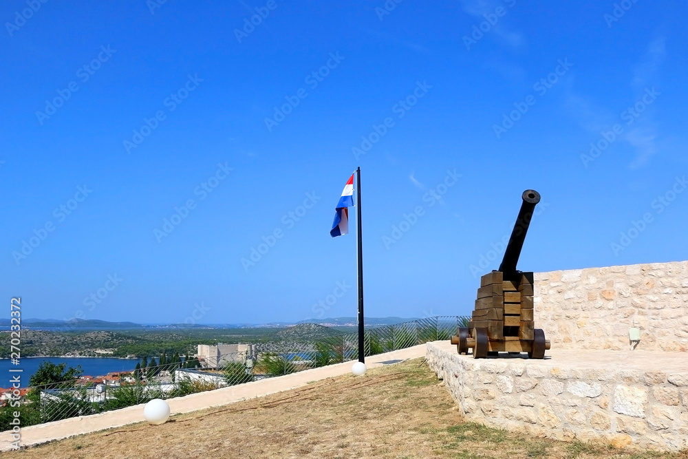 Croatian flag on historical Barone Fortress in Sibenik, Croatia. Sibenik is popular summer travel destination.