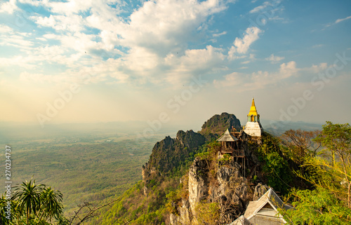 Wat chaloem phrachomklao rachanuson that the tample and pagoda on rock mountain in sunshine beautiful. Architecture landmark Lampang,Thailand