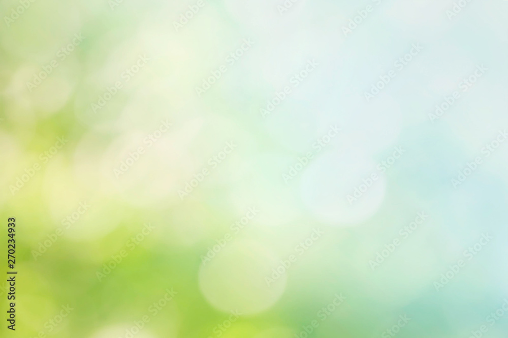 Abstract blur spring background. Green and blue bokeh
