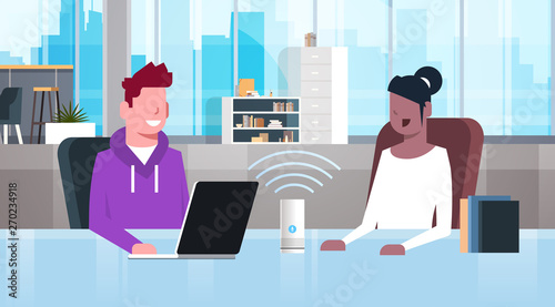 mix race people sitting at workplace desk man woman using intelligent smart speaker with voice recognition artificial intelligence assistance concept modern office interior flat horizontal portrait
