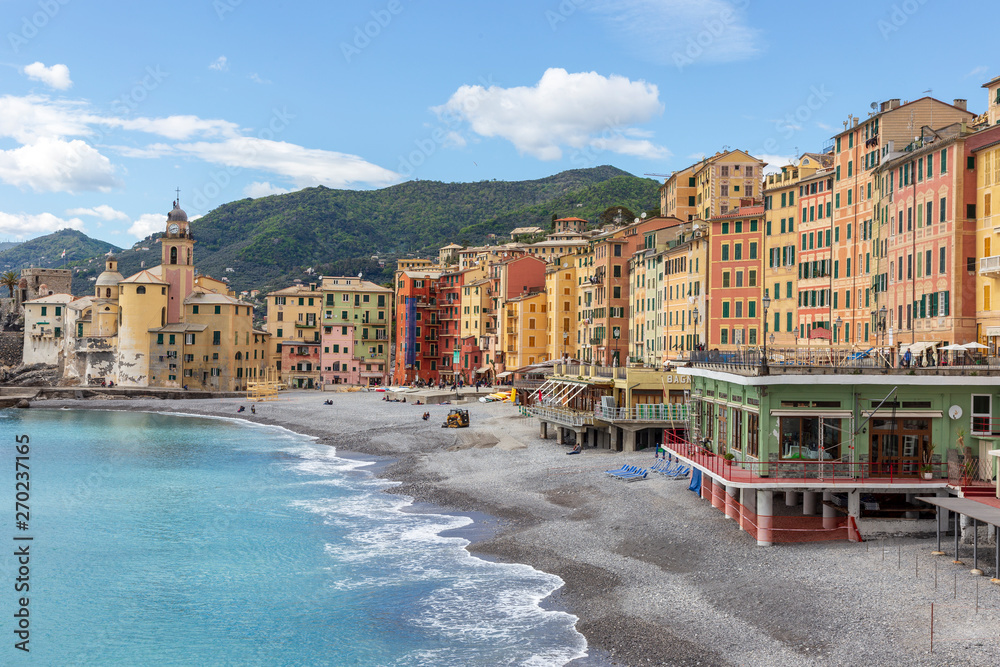 Camogli, Italy. 04-29-2019. Beach and colored houses at Camogli. Liguria. Italy.
