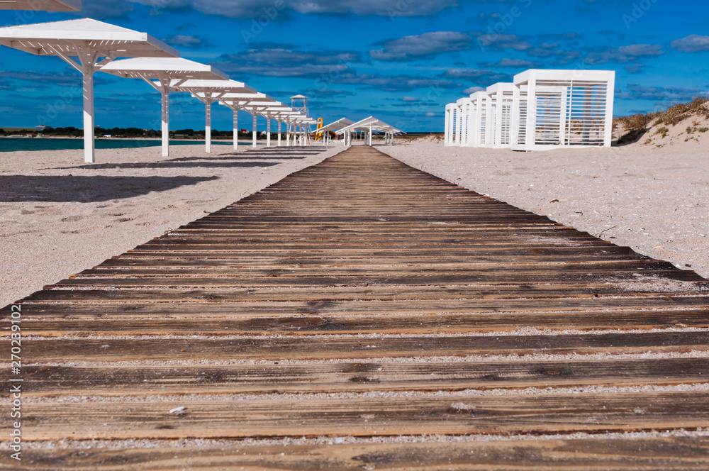 Fototapeta premium wooden path on the beach