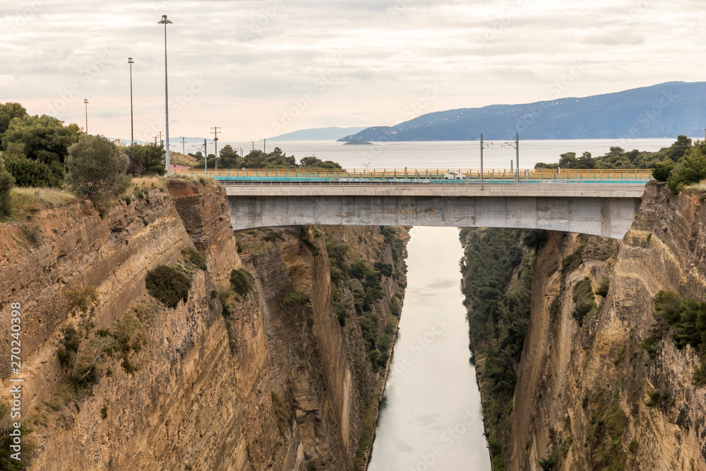 The Corinth Canal, Greece, a channel done in 1893 that cuts the narrow Isthmus of Corinth and separates the Peloponnese from the Greek mainland