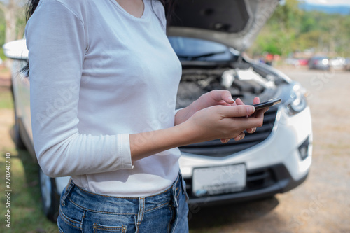 Woman Calling To Report broken car on Country Road - Image