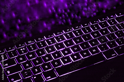 Purple light colour black keyboard with copy space