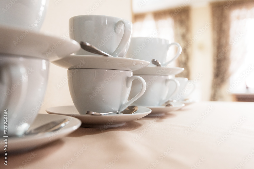 Many cups on table, concept of catering, food service or banquet service Many cups on table, concept of catering, food service or banquet service