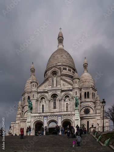 Paris, France, February 22, 2013: The Sacred Heart Basilica on the Montmartre hill in Paris in France © rparys