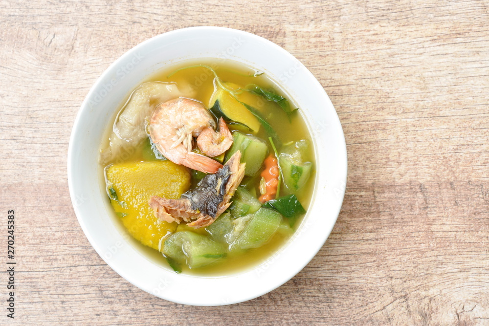 boiled spicy mixed vegetable with shrimp and smoked dry fish soup on bowl