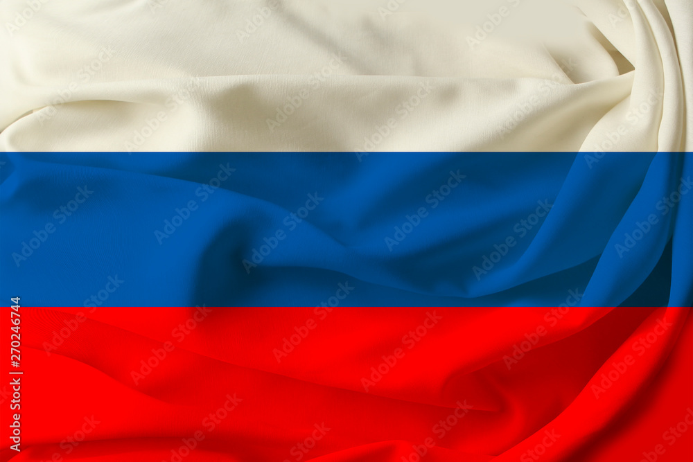 Fototapeta premium beautiful colored russia flag on pleated silk fabric