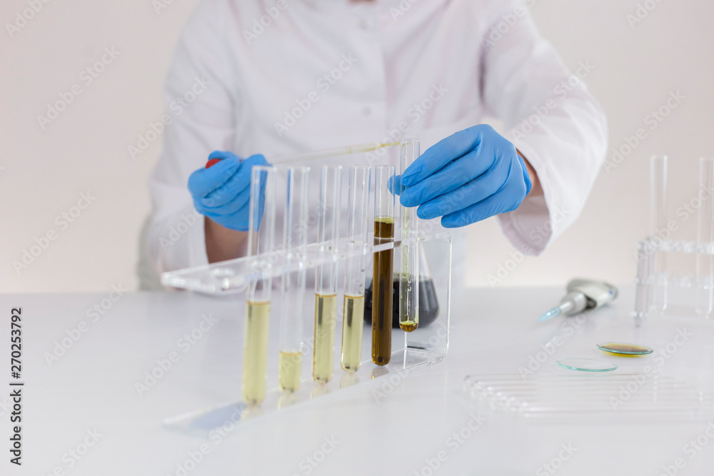 Experimental titration of the CBD oil in a glass tube Experimental titration of the CBD oil in a glass tube