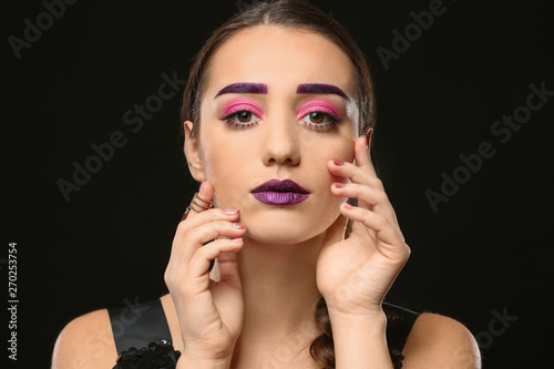 Young woman with dyed eyebr...