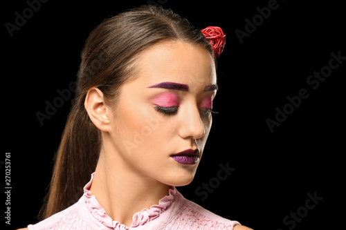 Young woman with dyed eyebr...