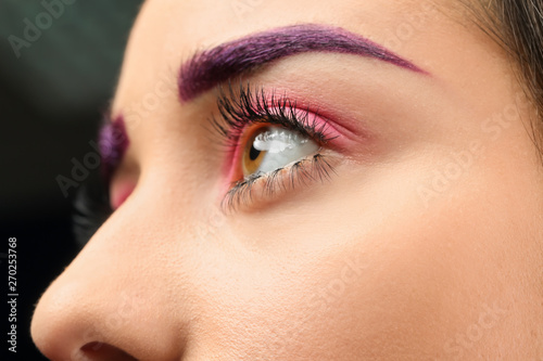 Young woman with dyed eyebr...