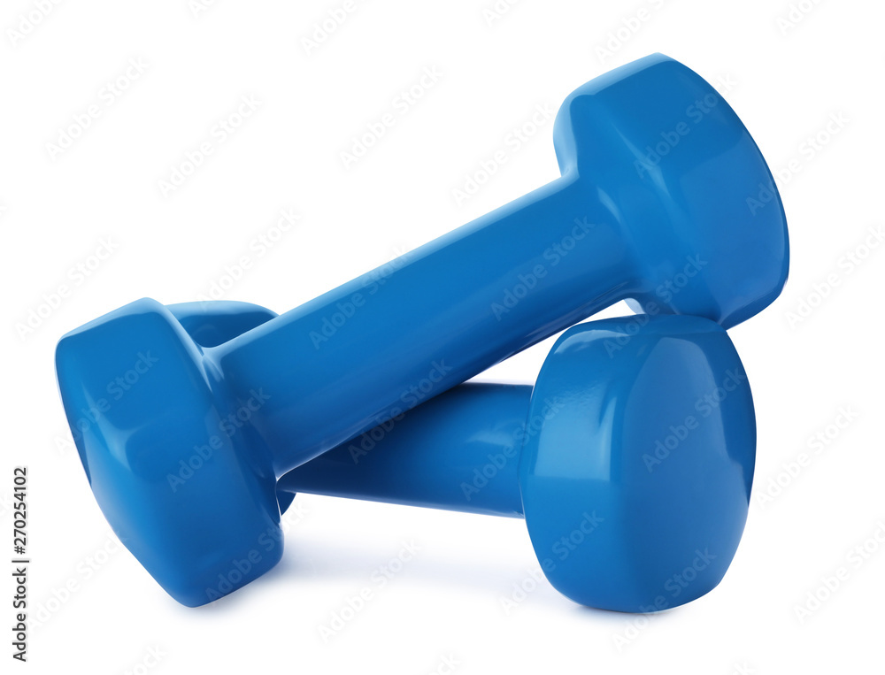 Color dumbbells on white background. Home fitness Color dumbbells on white background. Home fitness