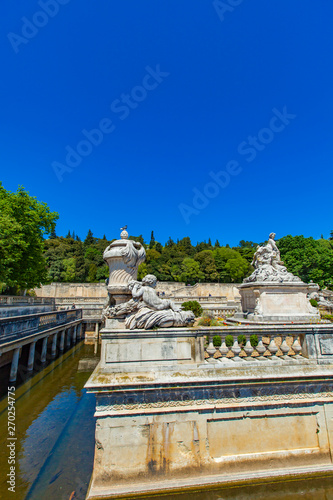 A beautiful fountain in the Jardin de la fontaine in Nimes, France