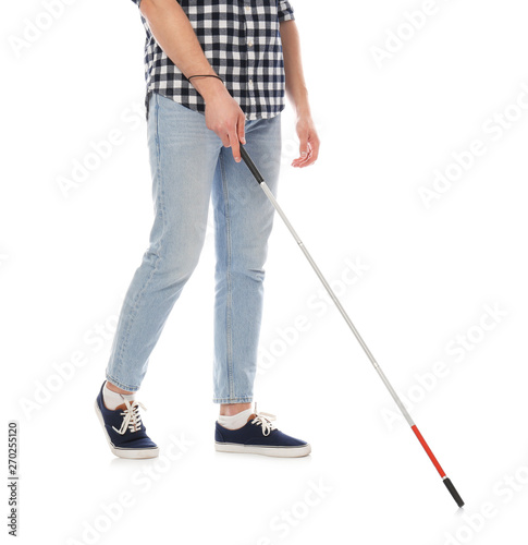 Blind person with long cane walking on white background