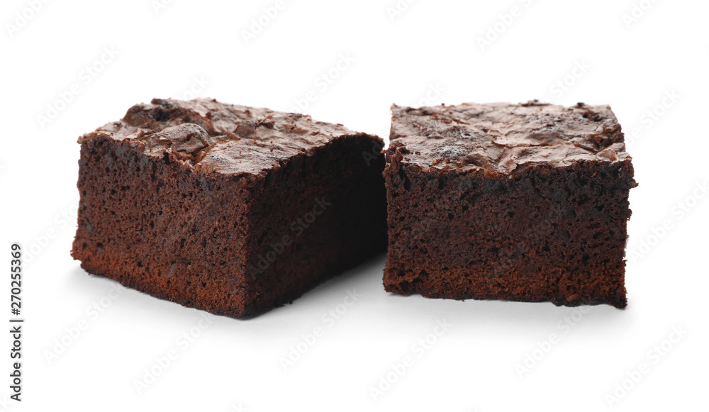 Pieces of fresh brownie on white background. Delicious chocolate pie Pieces of fresh brownie on white background. Delicious chocolate pie