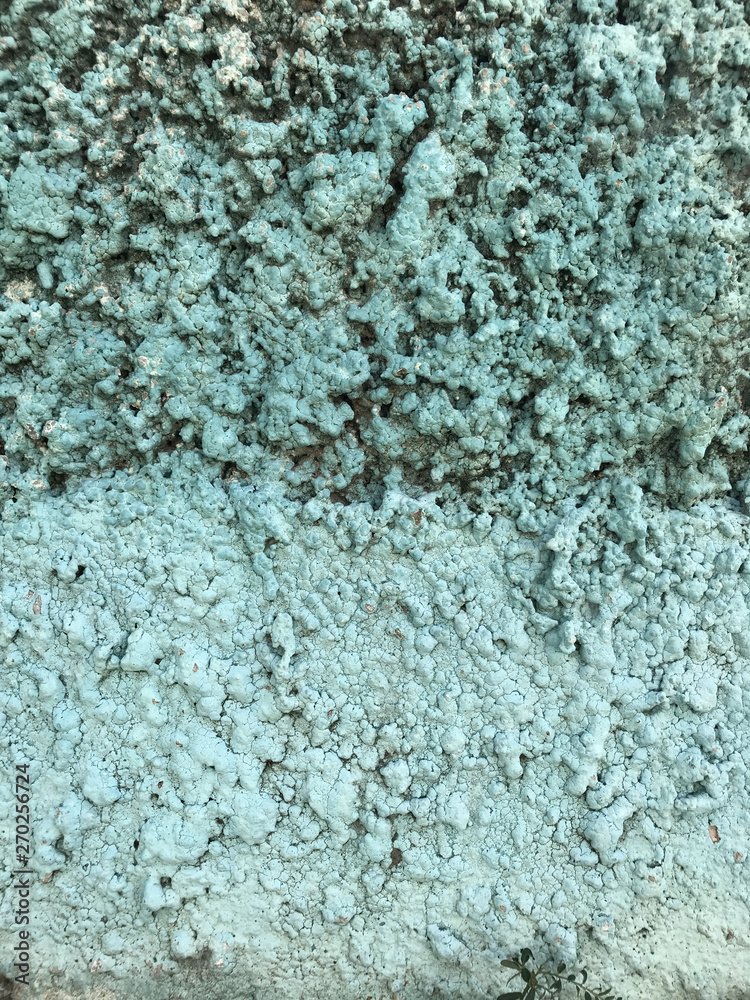 Turquoise rough concrete wall background