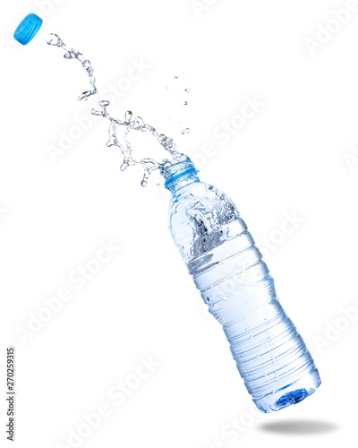Water splash out of bottle isolated on white background.